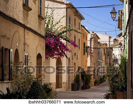 "Narrow alleyway, Alcudia, Majorca, Balearic Islands, Spain, Europe" View Large Photo Image Stock Image - "Narrow alleyway, Alcudia, Majorca, Balearic Islands, Spain, Europe". Fotosearch