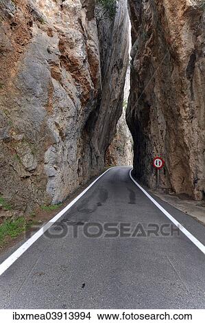 "Narrow canyon on the mountain road to Sa Calobra, Serra de Tramuntana, Majorca, Balearic Islands, Spain, Europe" View Large Photo Image Picture - "Narrow canyon on the mountain road to Sa Calobra, Serra de Tramuntana, Majorca, Balearic Islands, Spain, Europe". Fotosearch