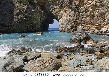 Picture - "Natural arch, coast in Antiochia ad Cragum, Turkish Riviera, Gazipasa, Antalya Province, Turkey, Asia". Fotosearch