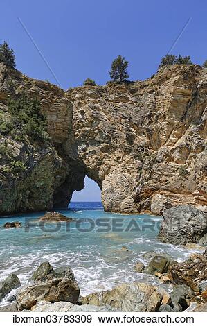 Stock Photo - "Natural arch, coast in Antiochia ad Cragum, Turkish Riviera, Gazipasa, Antalya Province, Turkey, Asia". Fotosearch
