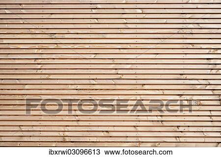 "Natural coloured wood sheathing of a holiday house, made of planed board" View Large Photo Image Stock Image - "Natural coloured wood sheathing of a holiday house, made of planed board". Fotosearch