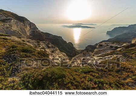 "Nature landscape with view of the crater of Nea Kameni, sunset, Santorini, Cyclades, Aegean Sea, Greece, Europe" View Large Photo Image Stock Photography - "Nature landscape with view of the crater of Nea Kameni, sunset, Santorini, Cyclades, Aegean Sea, Greece, Europe". Fotosearch