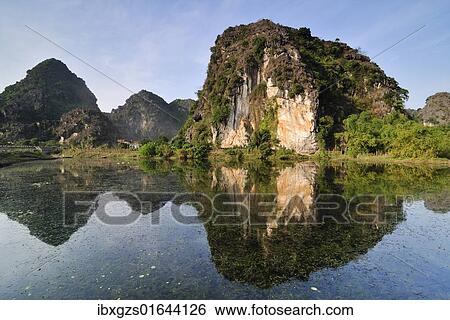 Stock Photograph - "Near Ninh Binh, dry Halong Bay, Vietnam, Southeast Asia, Asia". Fotosearch