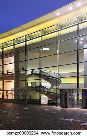 "Neues Museum, glass facade with the illuminated staircase and the exhibit rooms at dusk, city centre, Nuremberg, Middle Franconia, Bavaria, Germany, Europe" View Large Photo Image Picture - "Neues Museum, glass facade with the illuminated staircase and the exhibit rooms at dusk, city centre, Nuremberg, Middle Franconia, Bavaria, Germany, Europe". Fotosearch