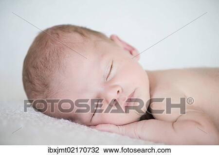 "Newborn baby, 3 weeks, sleeping" View Large Photo Image Stock Image - "Newborn baby, 3 weeks, sleeping". Fotosearch