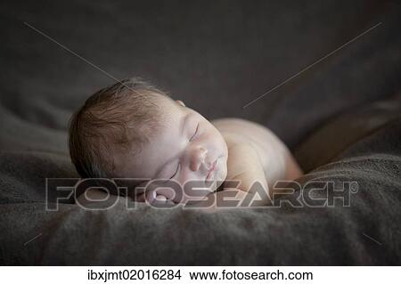 "Newborn baby, five days, asleep" View Large Photo Image Picture - "Newborn baby, five days, asleep". Fotosearch