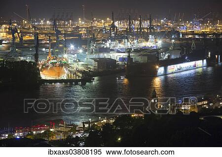 Stock Photography - "Night view of Hamburg harbor with jetties, Hamburg, Germany, Europe". Fotosearch