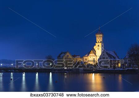 "Night view of the Church of St. George, Wasserburg - Bodensee, Swabia, Bavaria, Germany, Europe" View Large Photo Image Stock Photo - "Night view of the Church of St. George, Wasserburg - Bodensee, Swabia, Bavaria, Germany, Europe". Fotosearch