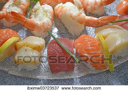 "Nigiri sushi with salmon, tuna, scallops and prawns" View Large Photo Image Stock Photo - "Nigiri sushi with salmon, tuna, scallops and prawns". Fotosearch