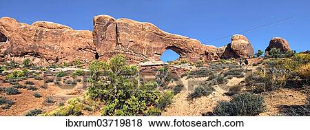 Stock Photo - "North Window Arch, a stone arch of red sandstone formed by erosion, Arches-Nationalpark, near Moab, Utah, United States, North America". Fotosearch