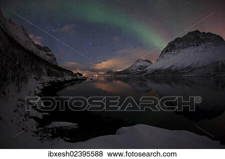Stock Photo - "Northern Lights over the Grotfjord in winter, Kvaloya, Tromso, Norway, Europe". Fotosearch