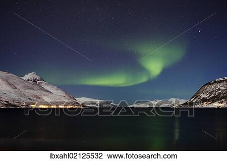 Stock Image - "Northern lights over the Kaldfjord, Kvaloya, Tromso or Tromso, Norway, Europe". Fotosearch