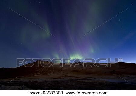 Stock Image - "Northern lights, sulphur and other minerals, steam, Hverarond high temperature or geothermal area, Namafjall mountains, Myvatn area, Northeastern Region, Iceland, Europe". Fotosearch