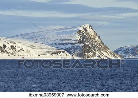 "Norwegian Sea and island coast with buildings, Mageroya island, Finnmark County, Norway, Europe" View Large Photo Image Stock Photo - "Norwegian Sea and island coast with buildings, Mageroya island, Finnmark County, Norway, Europe". Fotosearch