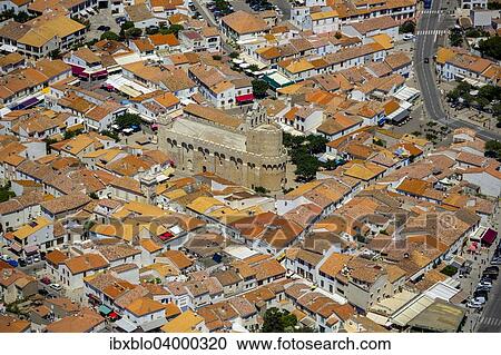 "Notre-Dame-de-la-Mer Church, city centre, Saintes-Maries-de-la-Mer, Camargue, Provence-Alpes-Cote d'Azur, France, Europe" View Large Photo Image Stock Image - "Notre-Dame-de-la-Mer Church, city centre, Saintes-Maries-de-la-Mer, Camargue, Provence-Alpes-Cote d'Azur, France, Europe". Fotosearch