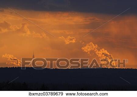 "Nuremberg television tower in the evening light, 20 km away from Tauchersreuth, right and left fuming chimneys of thermal power stations, Middle Franconia, Bavaria, Germany, Europe" View Large Photo Image Stock Photo - "Nuremberg television tower in the evening light, 20 km away from Tauchersreuth, right and left fuming chimneys of thermal power stations, Middle Franconia, Bavaria, Germany, Europe". Fotosearch