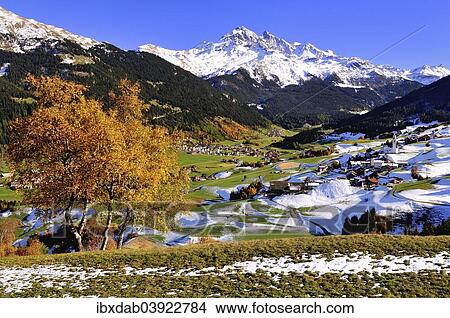 "Oberhalbstein in autumn with the villages Savognin and Parsonz, behind the snowy Piz d'Err, Graubunden, Switzerland, Europe" View Large Photo Image Picture - "Oberhalbstein in autumn with the villages Savognin and Parsonz, behind the snowy Piz d'Err, Graubunden, Switzerland, Europe". Fotosearch