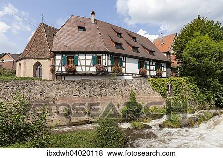 "Oberhof Chapel and half-timbered houses on the river Weiss, Kaysersberg, Alsace, France, Europe" View Large Photo Image Stock Photo - "Oberhof Chapel and half-timbered houses on the river Weiss, Kaysersberg, Alsace, France, Europe". Fotosearch