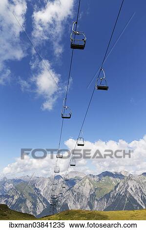 "Obermooslift chairlift, Sonnenkopf skiing region, Lechquellen Mountains at the back, Verwall mountains, Vorarlberg, Austria, Europe" View Large Photo Image Stock Photography - "Obermooslift chairlift, Sonnenkopf skiing region, Lechquellen Mountains at the back, Verwall mountains, Vorarlberg, Austria, Europe". Fotosearch