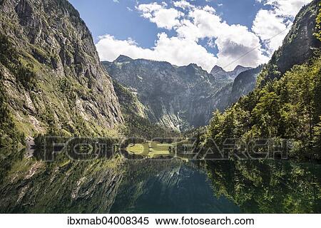 "Obersee lake with water reflection, Salet on lake Konigssee, Berchtesgaden National Park, Berchtesgadener Land district, Upper Bavaria, Bavaria, Germany, Europe" View Large Photo Image Stock Photography - "Obersee lake with water reflection, Salet on lake Konigssee, Berchtesgaden National Park, Berchtesgadener Land district, Upper Bavaria, Bavaria, Germany, Europe". Fotosearch