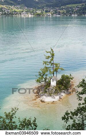 "Ochsenkreuz shrine on small island in Lake Wolfgangsee, Sankt Gilgen am Wolfgangsee, Salzkammergut, Salzburg state, Salzburg State, Austria, Europe" View Large Photo Image Stock Photo - "Ochsenkreuz shrine on small island in Lake Wolfgangsee, Sankt Gilgen am Wolfgangsee, Salzkammergut, Salzburg state, Salzburg State, Austria, Europe". Fotosearch
