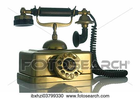 Stock Image - Old brass telephone. Fotosearch