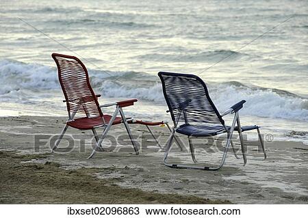 "Old, empty deck chairs at the beach of the northern Adriatic Sea near Cavallino camping site, Jesolo, Venice, Italy, Europe" View Large Photo Image Stock Image - "Old, empty deck chairs at the beach of the northern Adriatic Sea near Cavallino camping site, Jesolo, Venice, Italy, Europe". Fotosearch