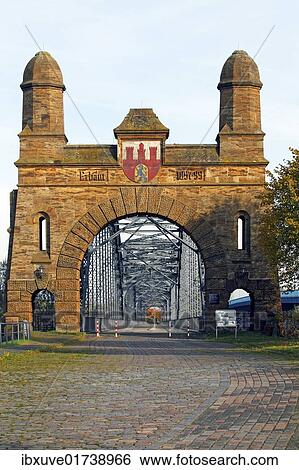 "Old Harburg Elbe bridge, historic portal bridge, built from 1897 to 1899, south portal with Harburg coat of arms, Harburg district, Hanseatic city of Hamburg, Germany, Europe" View Large Photo Image Stock Photograph - "Old Harburg Elbe bridge, historic portal bridge, built from 1897 to 1899, south portal with Harburg coat of arms, Harburg district, Hanseatic city of Hamburg, Germany, Europe". Fotosearch