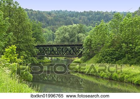Stock Photography - "Old railway bridge over the river Pegnitz in Enzendorf, Bavaria, Germany, Europe". Fotosearch