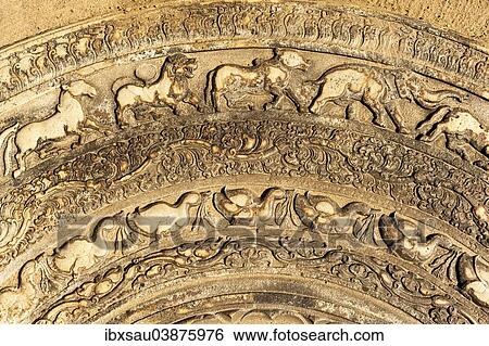 Stock Photograph - "Old rock relief, moonstone with depictions of animals, elephant, horse, lion, bull, geese, stair stone, Sandakada Pahana, Abhayagiri Vihara, Sri Lanka, Asia". Fotosearch
