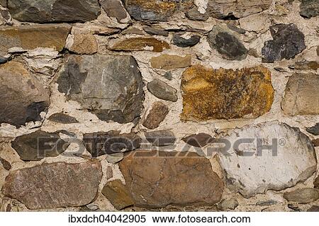 Stock Photography - "Old stone foundation on barn, Foster, Eastern Townships, Quebec, Canada, North America". Fotosearch