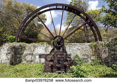 "Old sugar cane mill, mill wheel, rusted, Trinidad and Tobago, North America" View Large Photo Image Stock Photo - "Old sugar cane mill, mill wheel, rusted, Trinidad and Tobago, North America". Fotosearch