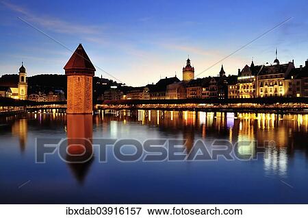 "Old town of Lucerne with Kapellbrucke bridge, Wasserturm tower and the Reuss river, at dusk, Lucerne, Canton of Lucerne, Switzerland, Europe" View Large Photo Image Stock Photo - "Old town of Lucerne with Kapellbrucke bridge, Wasserturm tower and the Reuss river, at dusk, Lucerne, Canton of Lucerne, Switzerland, Europe". Fotosearch