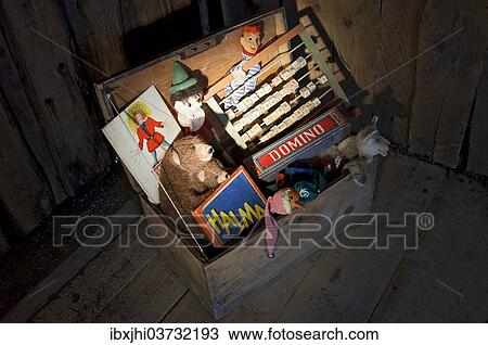 Old toys in a wooden chest View Large Photo Image Stock Image - Old toys in a wooden chest. Fotosearch