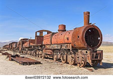"Old train in the train cemetery Cementerio de los Trenes, Uyuni, Bolivia, South America" View Large Photo Image Stock Image - "Old train in the train cemetery Cementerio de los Trenes, Uyuni, Bolivia, South America". Fotosearch