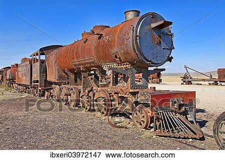 "Old train in the train cemetery Cementerio de los Trenes, Uyuni, Bolivia, South America" View Large Photo Image Stock Photo - "Old train in the train cemetery Cementerio de los Trenes, Uyuni, Bolivia, South America". Fotosearch