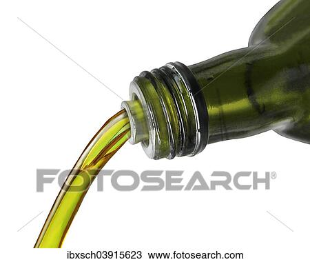 Stock Image - Olive oil pouring from a bottle. Fotosearch