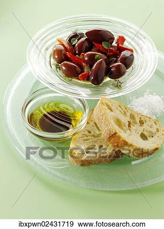 "Olives with ciabatta bread and oil for dipping, snacks" View Large Photo Image Stock Photo - "Olives with ciabatta bread and oil for dipping, snacks". Fotosearch