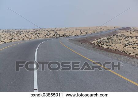 "Omani highway through the sand desert, Ad Dakhiliyah, Oman, Asia" View Large Photo Image Stock Image - "Omani highway through the sand desert, Ad Dakhiliyah, Oman, Asia". Fotosearch