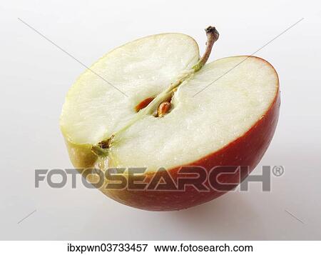 One half of a cut Braeburn apple View Large Photo Image Stock Photo - One half of a cut Braeburn apple. Fotosearch