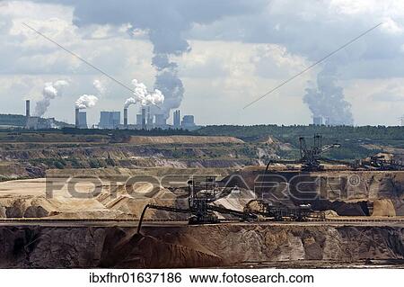 "Open pit Garzweiler with the Frimmersdorf, Neurath and Niederaussem power plants in the back, North Rhine-Westphalia, Germany, Europe" View Large Photo Image Stock Photograph - "Open pit Garzweiler with the Frimmersdorf, Neurath and Niederaussem power plants in the back, North Rhine-Westphalia, Germany, Europe". Fotosearch