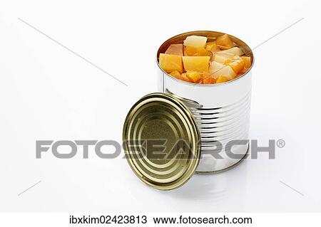 Stock Image - Opened tin can with tropical fruits. Fotosearch
