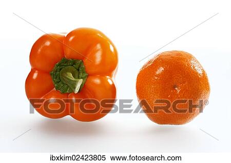Stock Photography - "Orange-coloured vegetables and fruit, orange bell pepper and tangerine". Fotosearch