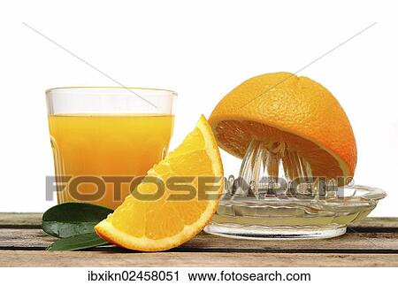"Orange juicer made of glass, orange, freshly squeezed orange juice" View Large Photo Image Stock Image - "Orange juicer made of glass, orange, freshly squeezed orange juice". Fotosearch