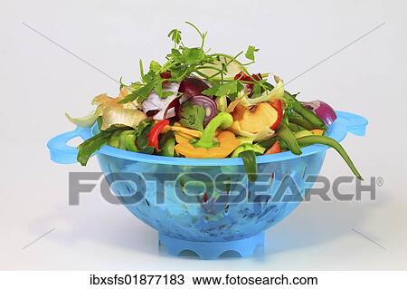"Organic kitchen waste with the remains of peppers, onions, cucumber, parsley and apple in a bowl for disposal in the compost or in the organic waste" View Large Photo Image Stock Image - "Organic kitchen waste with the remains of peppers, onions, cucumber, parsley and apple in a bowl for disposal in the compost or in the organic waste". Fotosearch