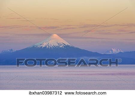 "Osorno volcano in the evening light, Frutillar, Los Lagos Region, Chile, South America" View Large Photo Image Stock Image - "Osorno volcano in the evening light, Frutillar, Los Lagos Region, Chile, South America". Fotosearch