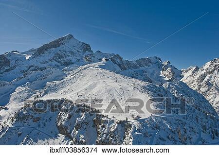 "Osterfelder ski slope, Hochalmbahn cable car, Alpspitze mountain and Zugspitze mountain, Wetterstein mountain range, Hollental valley, Garmisch-Partenkirchen, Bavaria, Germany, Europe" View Large Photo Image Picture - "Osterfelder ski slope, Hochalmbahn cable car, Alpspitze mountain and Zugspitze mountain, Wetterstein mountain range, Hollental valley, Garmisch-Partenkirchen, Bavaria, Germany, Europe". Fotosearch