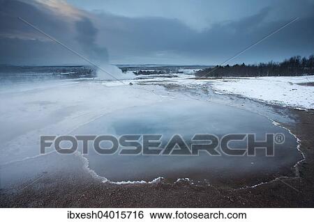 "Outbreak, Strokkur geyser in winter, Haukadalur, Southern Region, Iceland, Europe" View Large Photo Image Stock Photograph - "Outbreak, Strokkur geyser in winter, Haukadalur, Southern Region, Iceland, Europe". Fotosearch