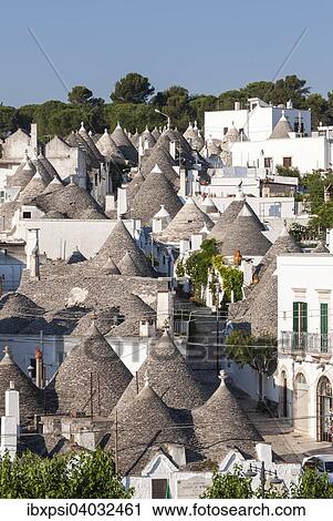 "Overlooking the conical roofs of the Trulli, Rione Monti District, Alberobello, Apulia, Italy, Europe" View Large Photo Image Stock Image - "Overlooking the conical roofs of the Trulli, Rione Monti District, Alberobello, Apulia, Italy, Europe". Fotosearch