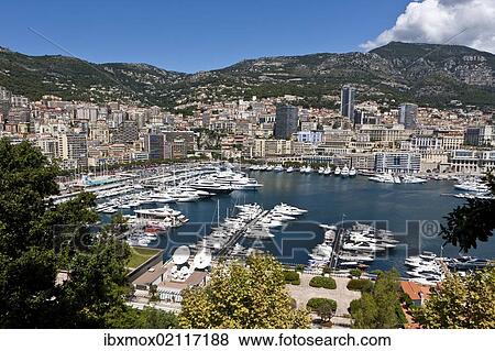 "Overlooking the harbour of Monaco, Port Hercule, Monte Carlo, Principality of Monaco, Cote d'Azur, Mediterranean Sea, Europe, PublicGround" View Large Photo Image Stock Photo - "Overlooking the harbour of Monaco, Port Hercule, Monte Carlo, Principality of Monaco, Cote d'Azur, Mediterranean Sea, Europe, PublicGround". Fotosearch